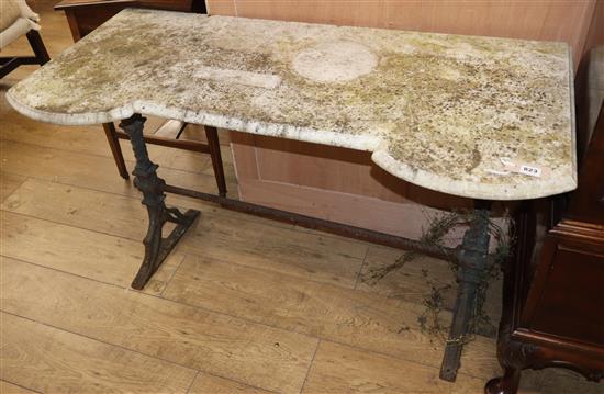 A Victorian marble top cast iron garden table Length 120cm